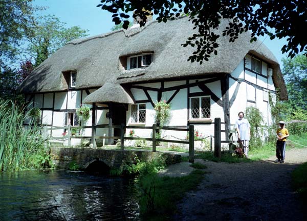 Thatched cottage built over a stream