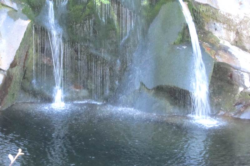 Water plunges into a pool