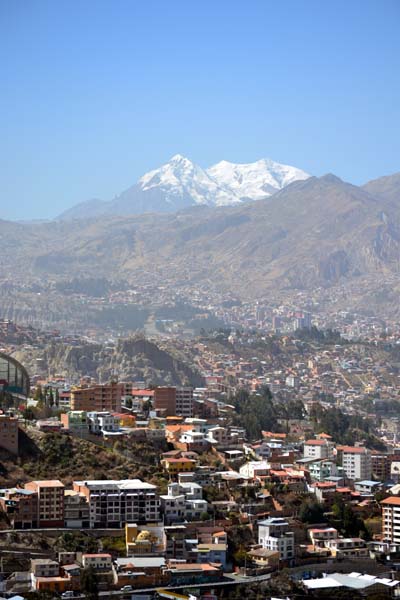 View over the city with a snow-covered mountain in the background