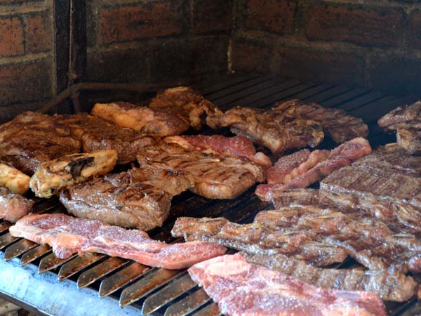 Slices of meat on a grill