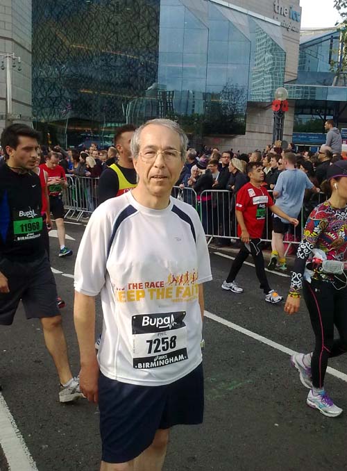 Phil facing the camera with Broad Street's hotels in the background