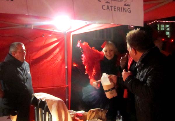 Clare has a drink at the catering stall