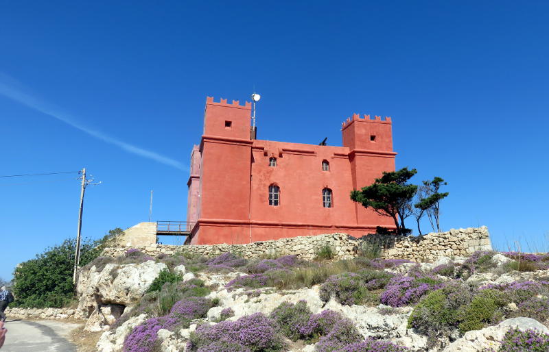 A red fort on a hilltop