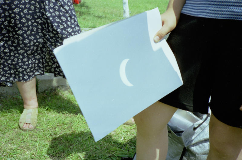 Projection of the sun, now just a crescent as the eclipse progresses