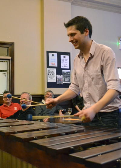 Ross playing the marimba