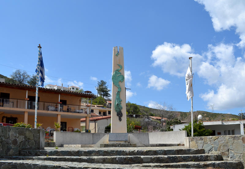 War memorial flanked by the Greek and Cypriot flags