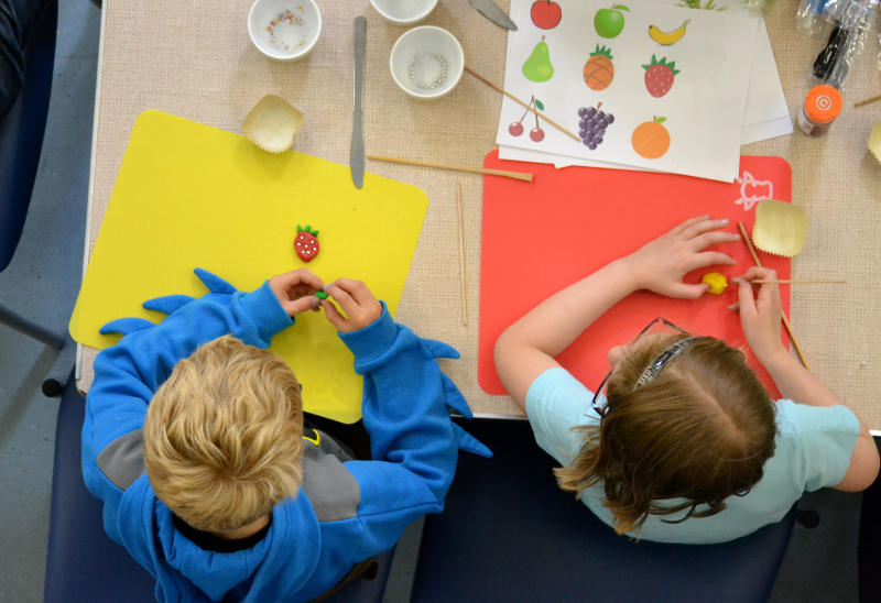 Looking down on a Messy Church craft activity