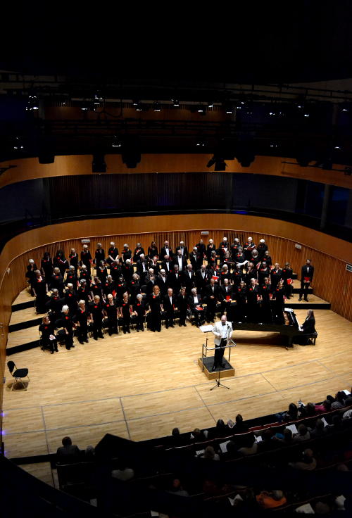 The Phoenix Singers gathered on stage