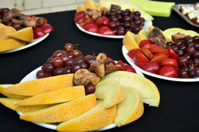 Slices of fruit set out on a table