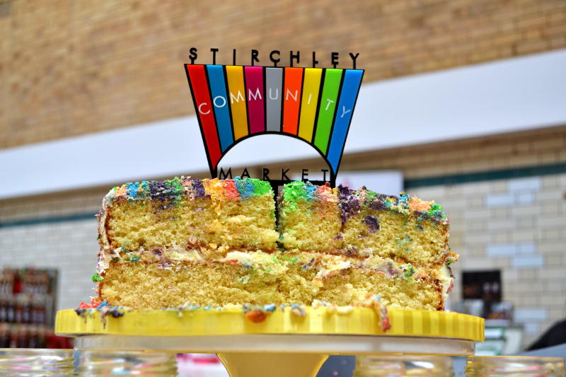 Sixth birthday cake, made and decorated with the Market's colours