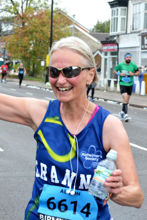 A runner with Granny on her shirt