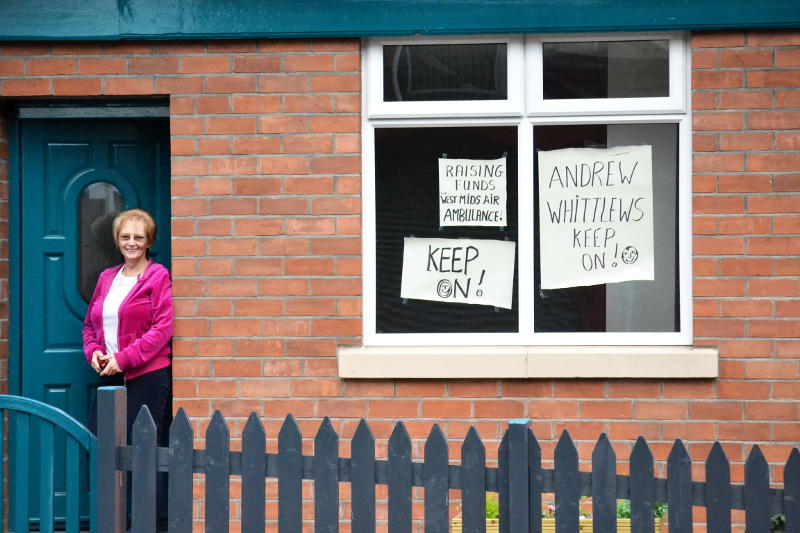 Fundraising posters on a house