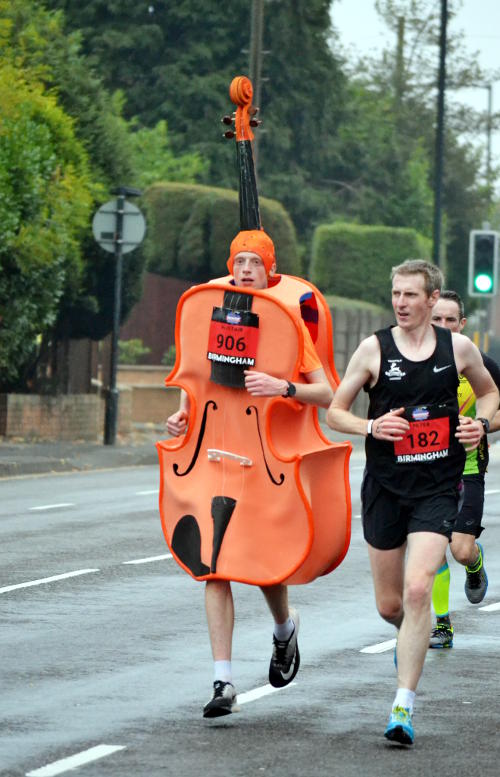 A runner in a viola costume