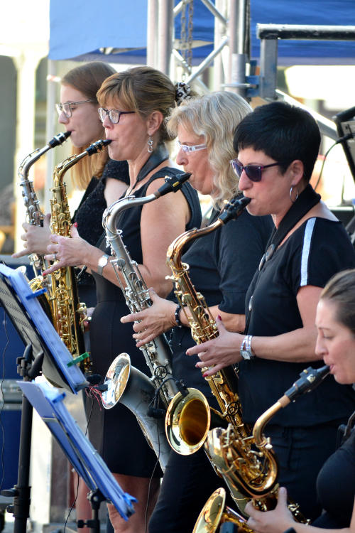 Four saxophone players