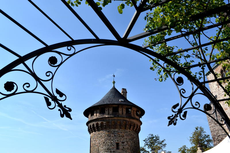 Tower at Schloss Wernigerode viewed through a pergola