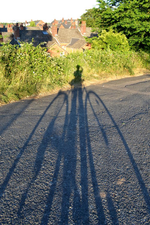 Bike shadow selfie by the canal with the rooftops of Stirchley in the background