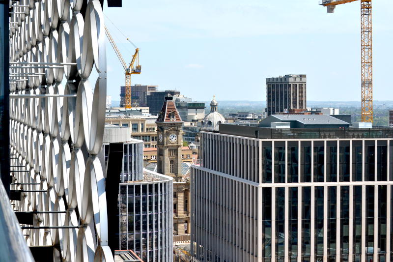 Rooftops and cranes viewed from the roof garden of the Library of Birmingham