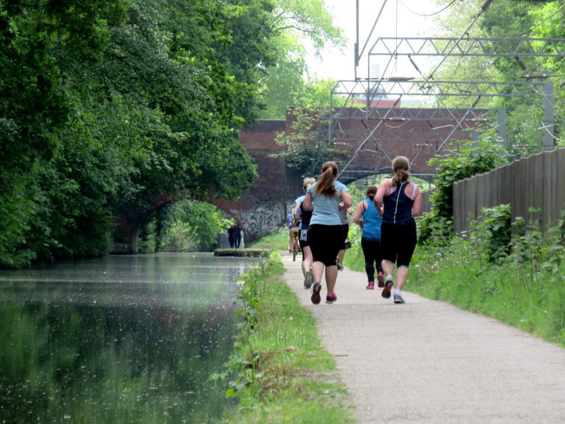 Runners on the canal towpath