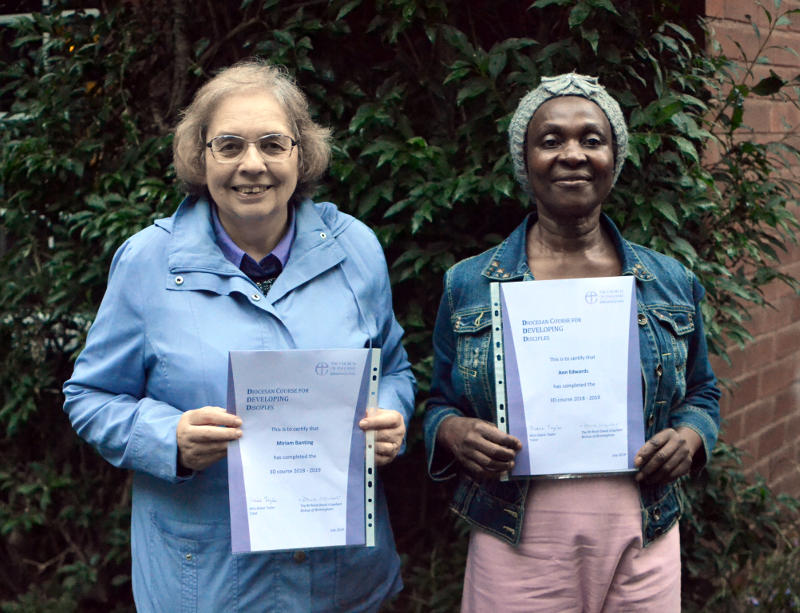 Miriam and friend Ann holding 3D certificates