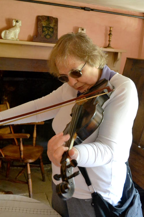 Miriam playing a violin