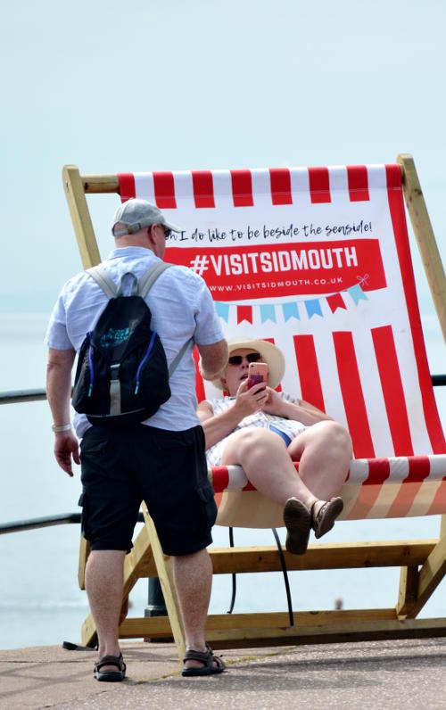 A woman in a giant deckchair