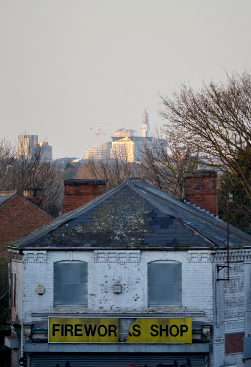 In the distance the Cube is lit up by evening sunshine, while the derelict fireworks shop dominates the foreground