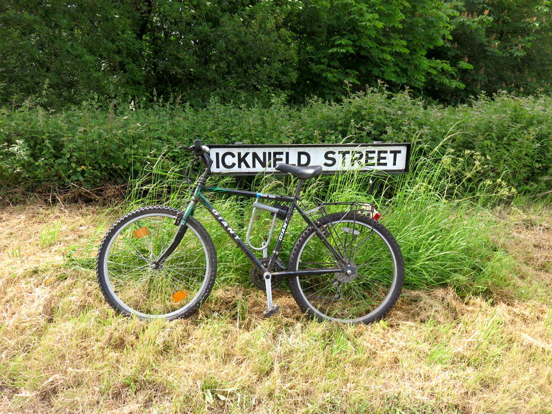 Bike leaning against a street sign for Icknield Street