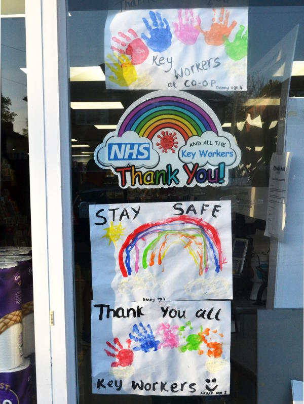 Children's drawings to thank key workers in a supermarket window