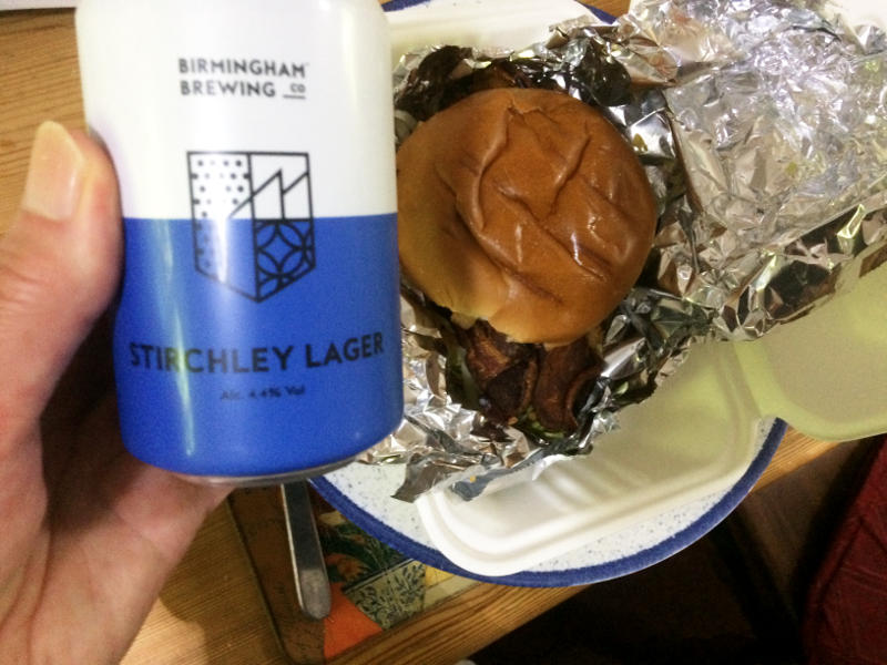 A can of Stirchley Lager and a beefburger