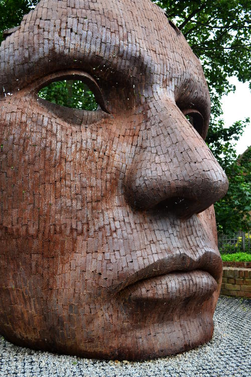 Metal sculpture of a face