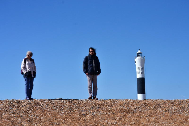 Miriam, Martin and a lighthouse on the shingle at Dungeness