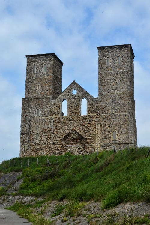 A ruined church frontage on a hill