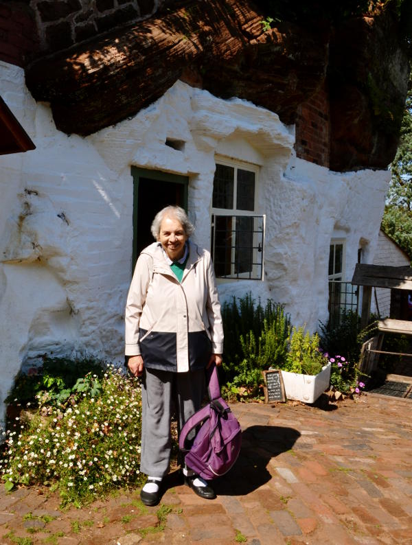 Miriam in front of one of the rock houses at Kinver