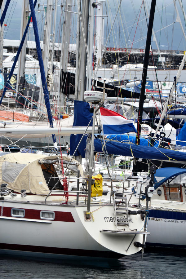 Close-up of yachts crowded in a harbour