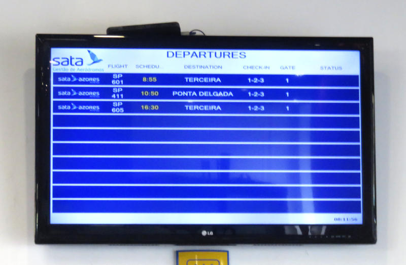 Airport departures board, showing just 3 flights in the day