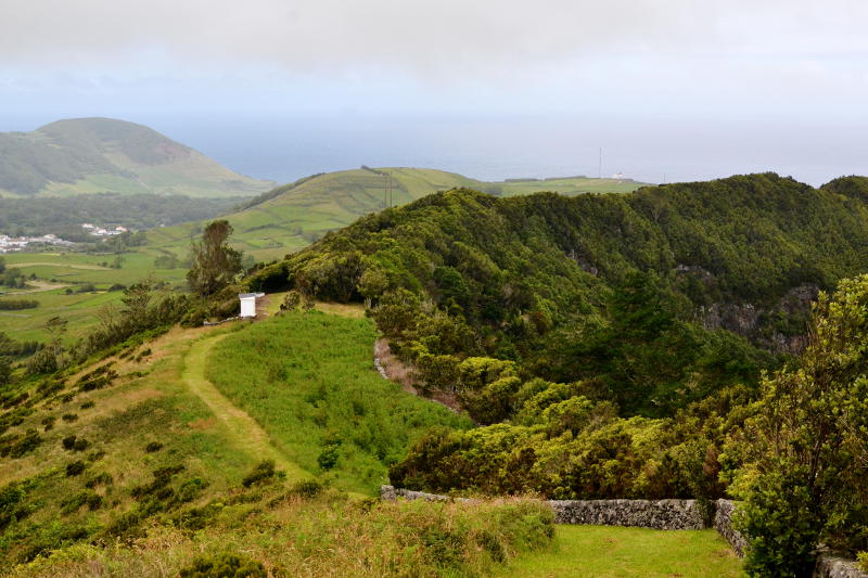 The wooded side of a volcanic caldera