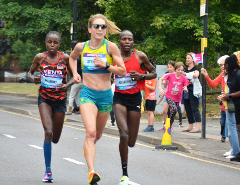 Marathon runners passing Christ Church