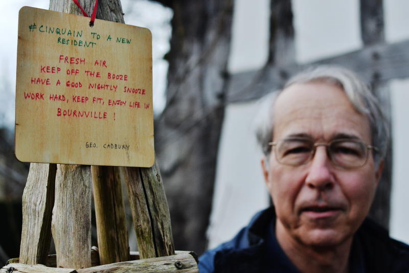 A short poem written on a wooden board next to a mugshot of Phil