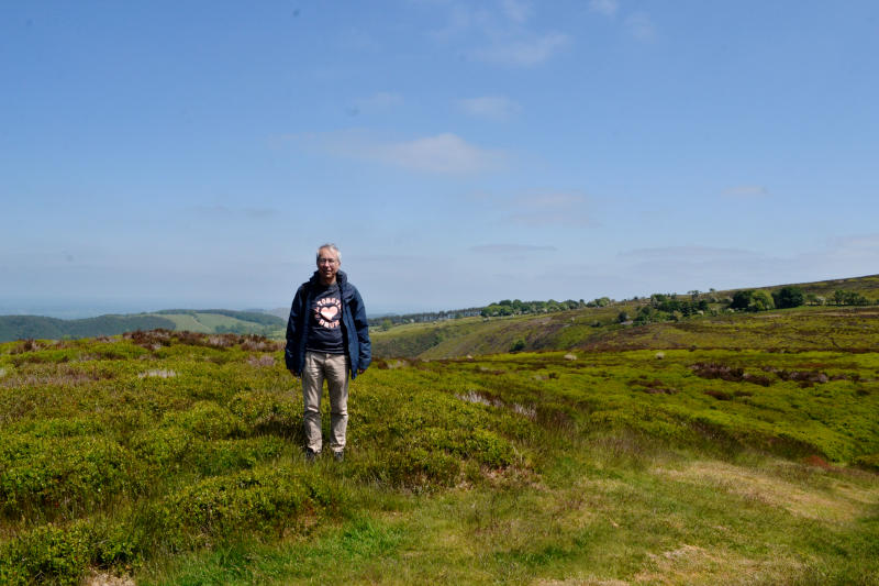 Phil standing on open moorland