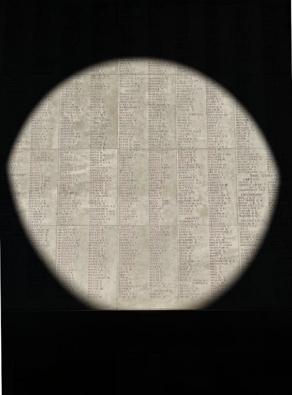 Humdreds of names engraved on an inside wall of the Menin Gate: they are illuminated by a near-circle of sunshine coming through one of the circular openings in the roof