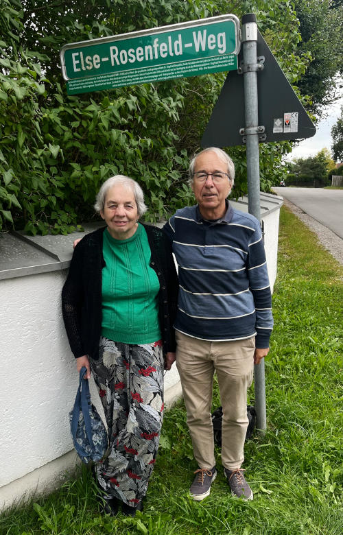 Miriam and Phil standing under a street sign for Else-Rosenfeld-Weg
