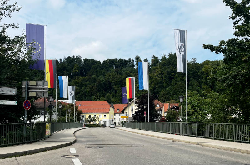 Road bridge with flags on either side